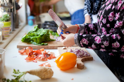 Close-up of hand preparing food