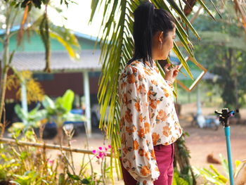 Woman looking at plants