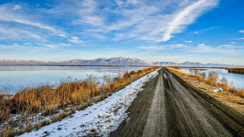 Panoramic view of lake against sky during winter