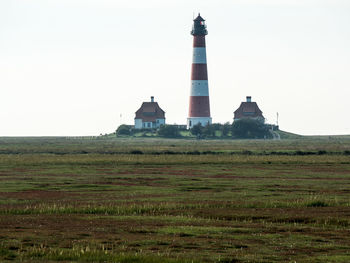 Lighthouse on landscape