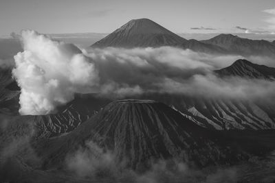 Scenic view of volcanic crater against sky