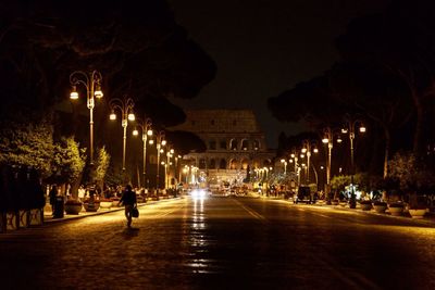 Illuminated street at night