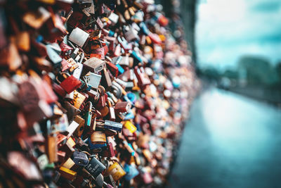 Close-up of padlocks on railing