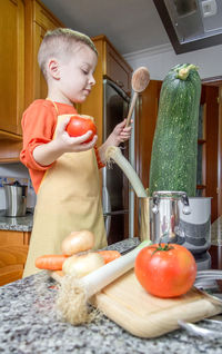 Girl holding food at home