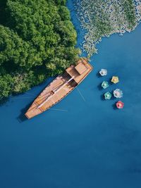 High angle view of sailboat moored on sea