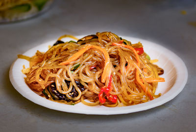 High angle view of noodles in plate on table