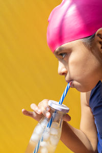 Close-up of woman drinking milk