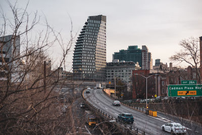 High angle view of buildings in city against sky