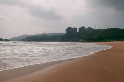 Scenic view of beach against sky