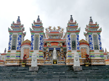 Low angle view of temple against building