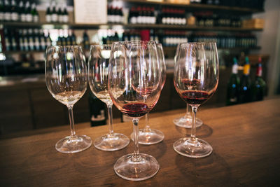 Wineglasses on table in bar