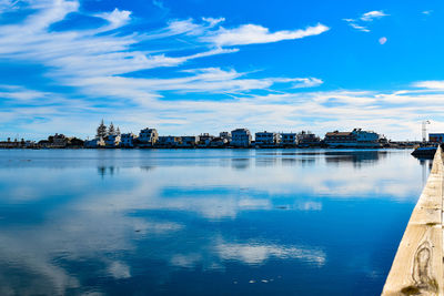 Scenic view of lake against blue sky