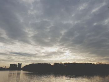 Scenic view of lake against sky during sunset