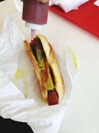 High angle view of hot dog on table