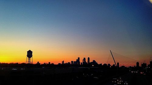 Silhouette of building at sunset