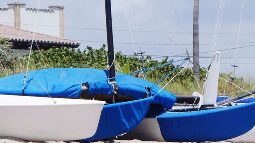 Low section of man lying on boat