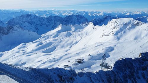 Scenic view of snow covered mountains