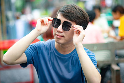 Portrait of boy photographing