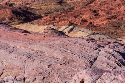 Purple, pink and orange rock wall at valley of fire state park near las vegas, nevada