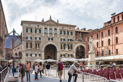 Group of people in front of historical building