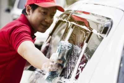Man working in car