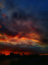 Scenic view of dramatic sky during sunset