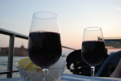 Close-up of wineglass on table