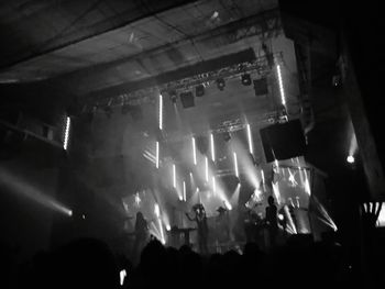 Rear view of people enjoying music concert