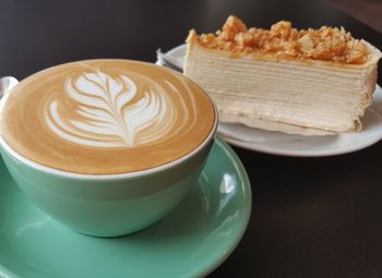 High angle view of cappuccino on table