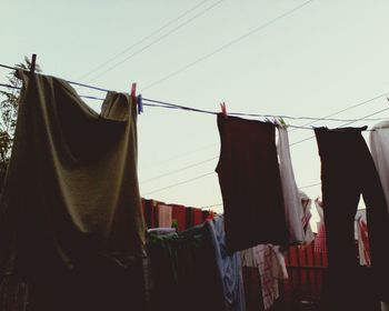 Low angle view of cables against sky