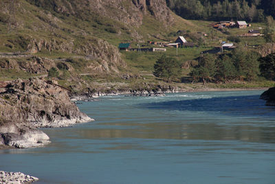 Scenic view of sea and buildings