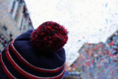 Close-up of person wearing hat