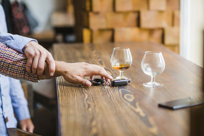 Midsection of man preparing food on table