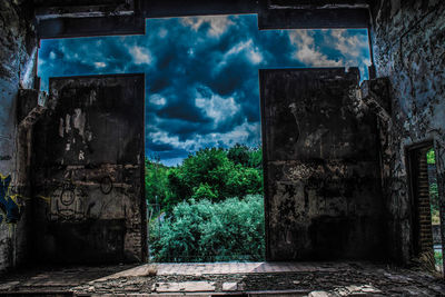 Old building against cloudy sky