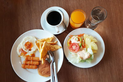 High angle view of breakfast served on table