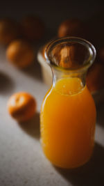 Close up of bottle of fresh orange juice .healthy food lifestyle diet detox vitamin c