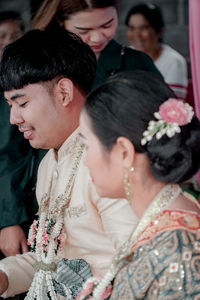 Couple kissing in temple