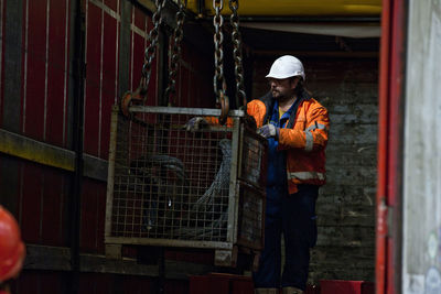 Industry, worker and indoor crane