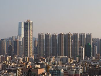Modern cityscape against clear sky
