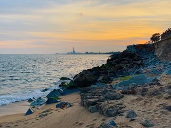 Scenic view of sea against sky during sunset