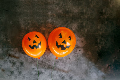 High angle view of pumpkin on orange during halloween