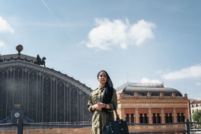 Portrait of modern muslim woman outdoors