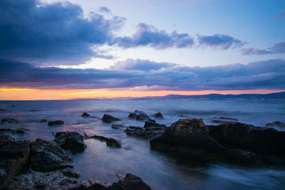 Scenic view of sea against sky during sunset