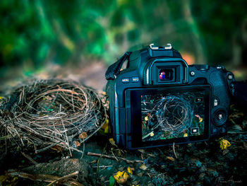 Close-up of camera on field