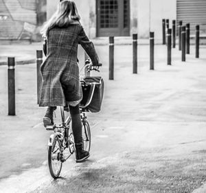 Woman riding bicycle
