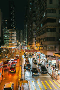 High angle view of traffic on city street at night