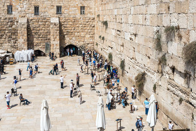 Group of people in front of historical building