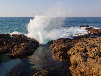 Scenic view of sea against clear sky