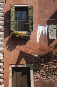 Built structure against building