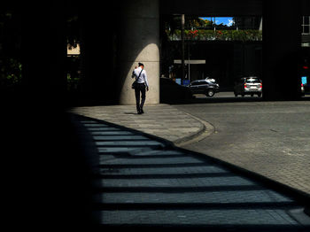 Full length of woman in city